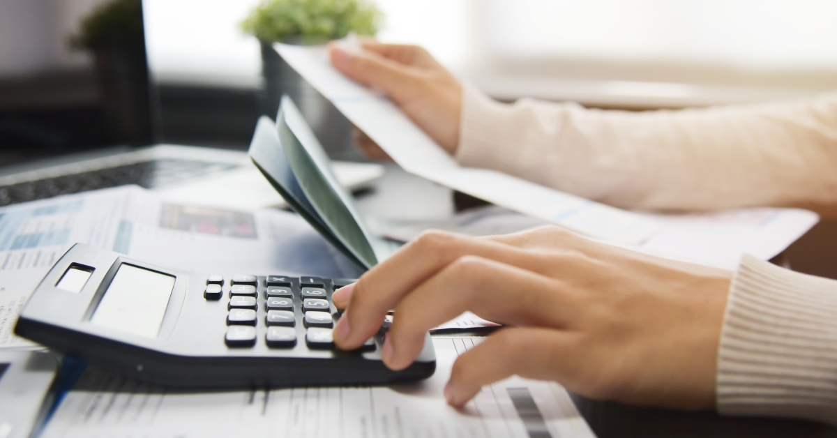 woman calculating her debt