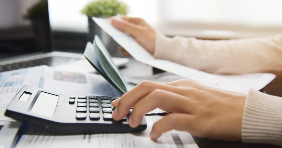 woman calculating her debt