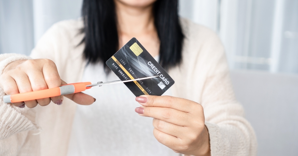 scissors cutting credit card financial
