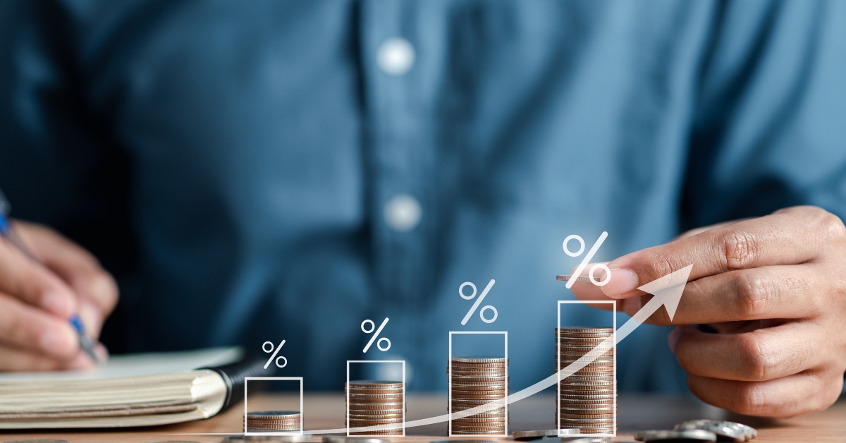 businessman stacking money coins accounting