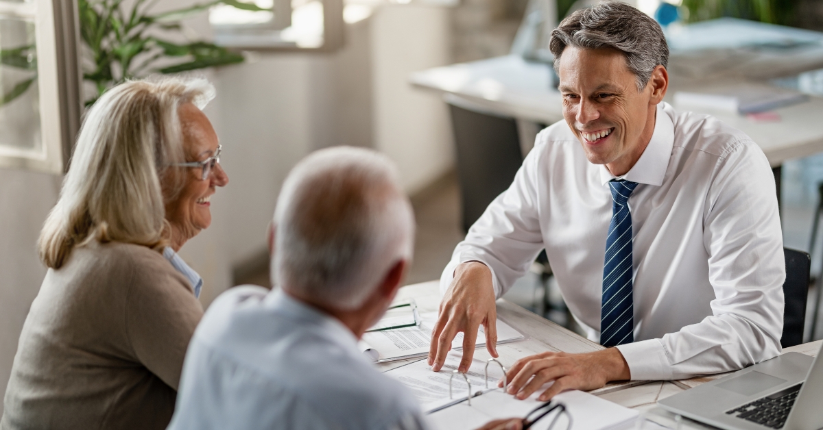financial advisor communicating with couple