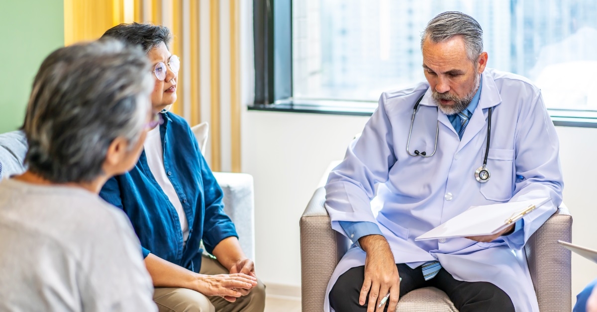 male doctor with senior people