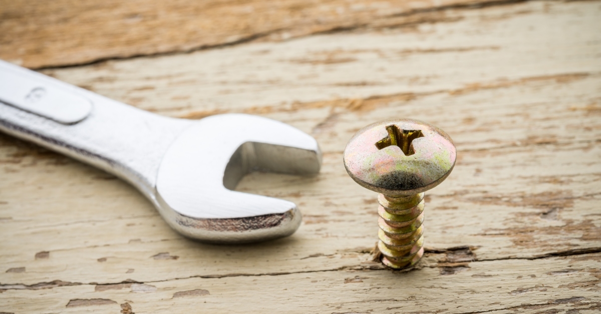 screw and open end wrench