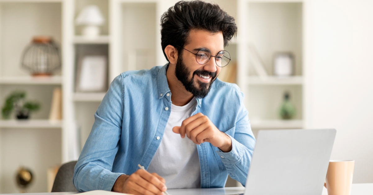 indian man watching webinar