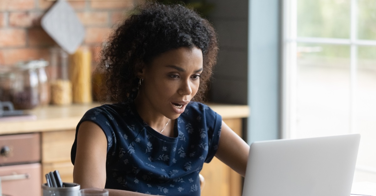 african american woman using laptop