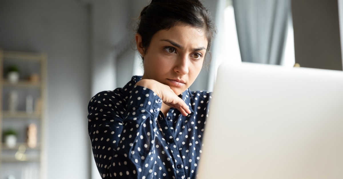 business woman using laptop at home