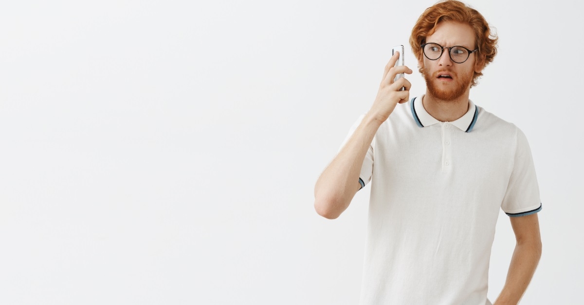 confused man talking on phone