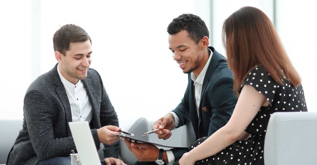 couple consulting male real estate agent