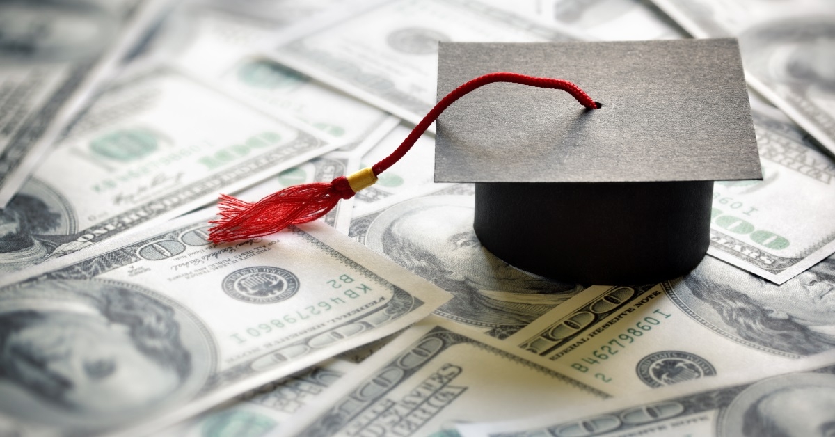 graduation hat with money education concept