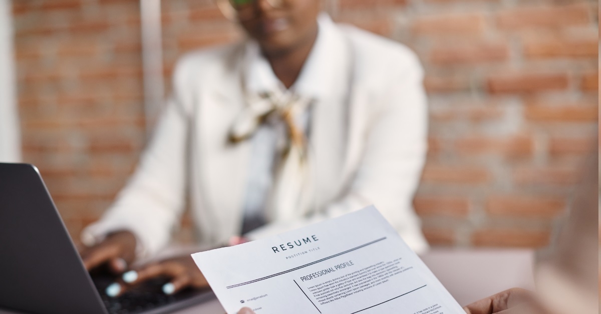 Job applicant holding her resume during the interview.