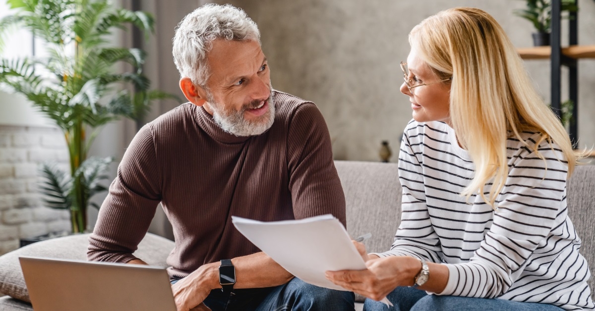 senior couple reviewing bills at home