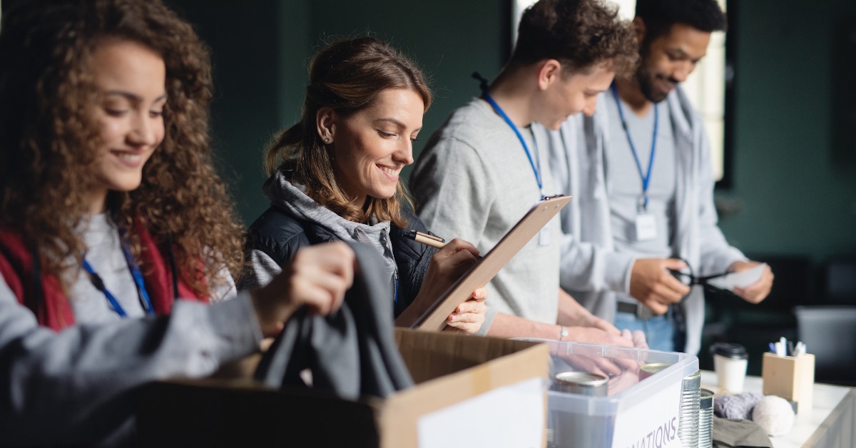 volunteers working in charity donation center