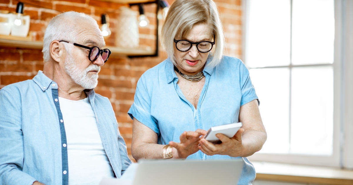 senior couple calculating some bills
