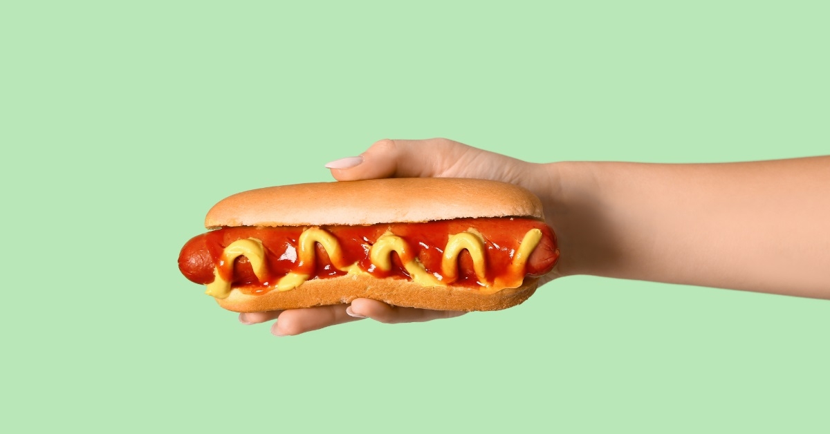 hot dog on green background