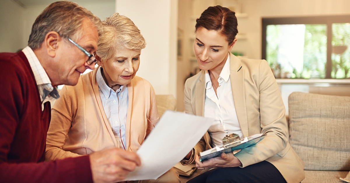 senior couple and financial advisor