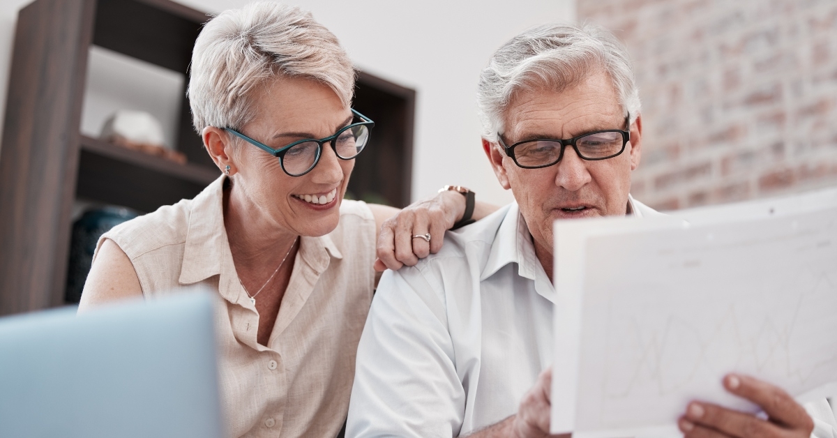 senior couple with invoice