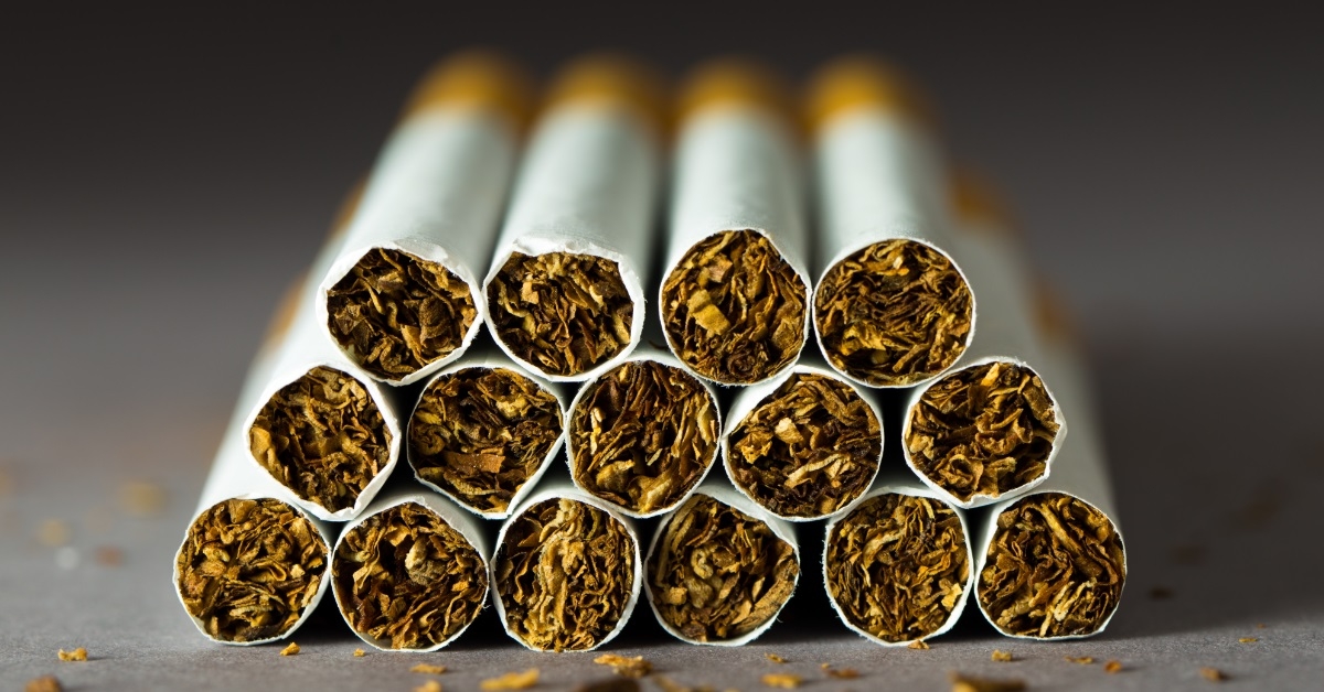 cigarettes stack on white blur background