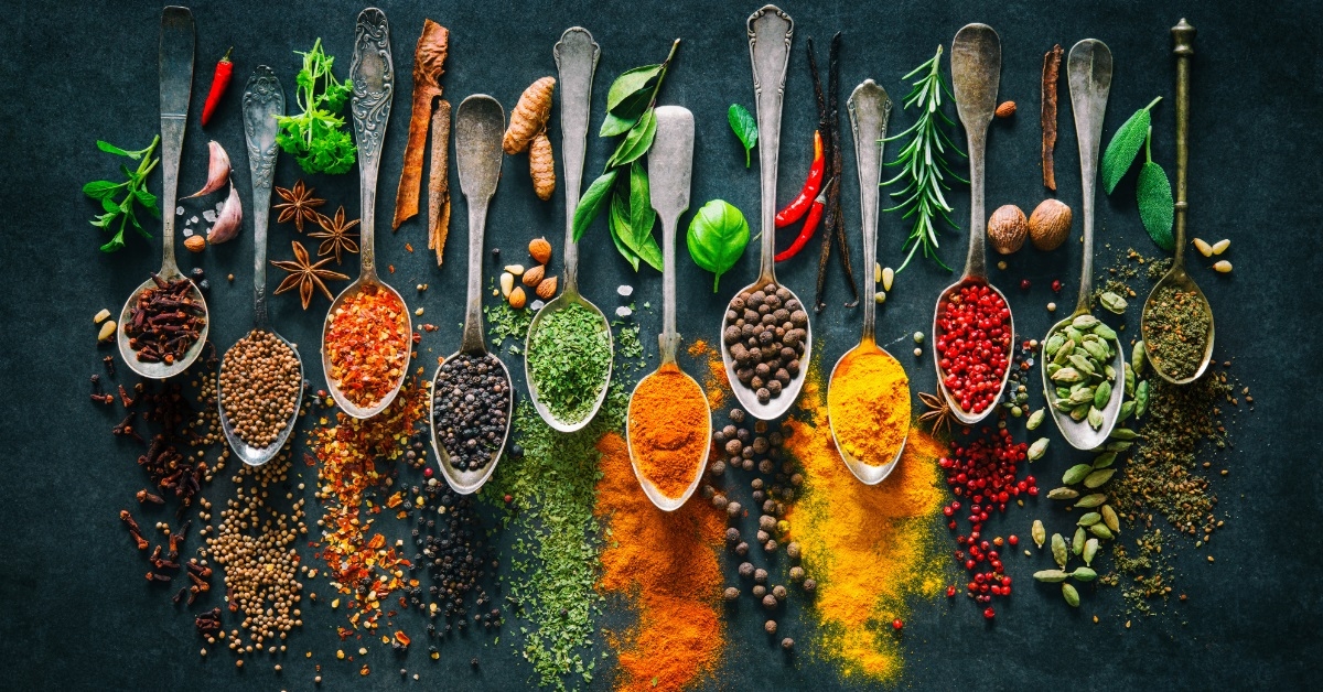 herbs and spices in spoons