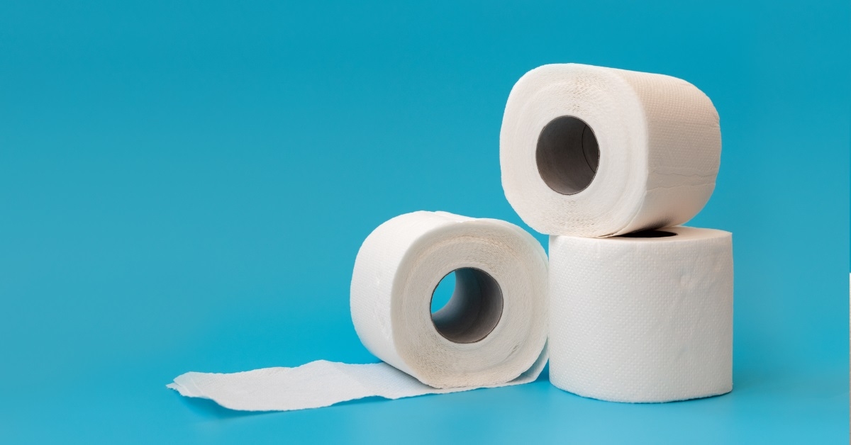 toilet rolls over blue background