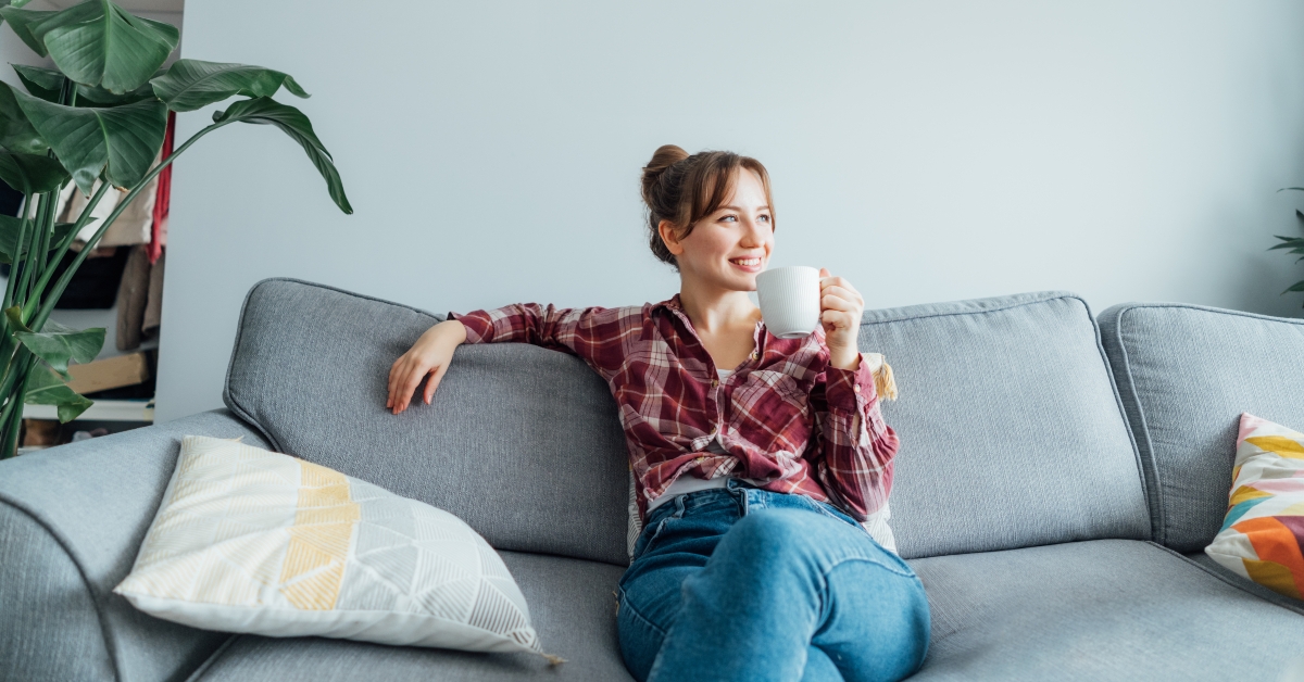 woman sitting on sofa