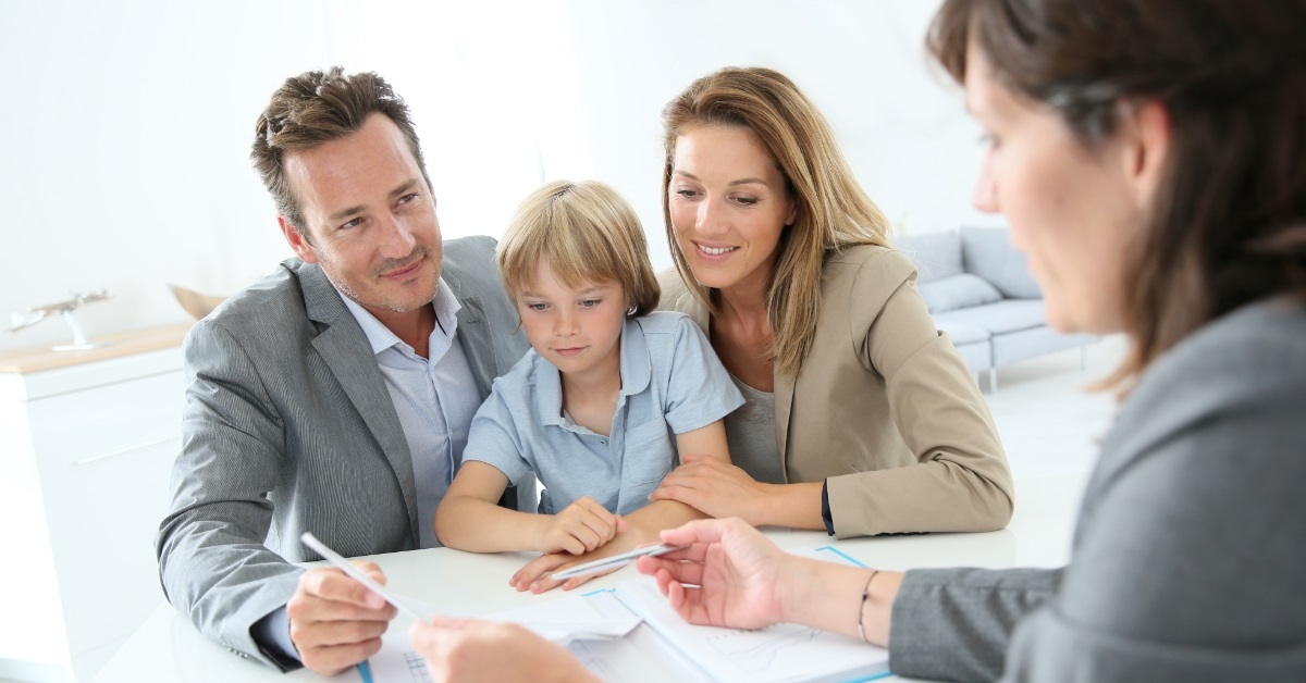 family choosing home with property agent