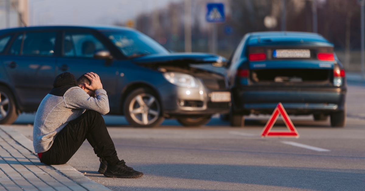 sad man after car accident