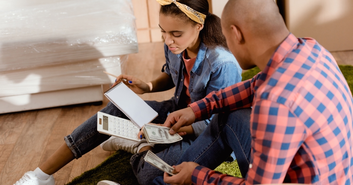 couple with money and calculator