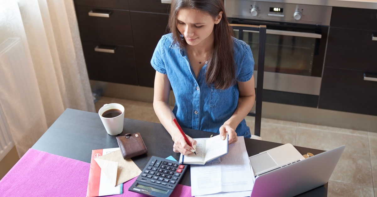 making notes in notebook