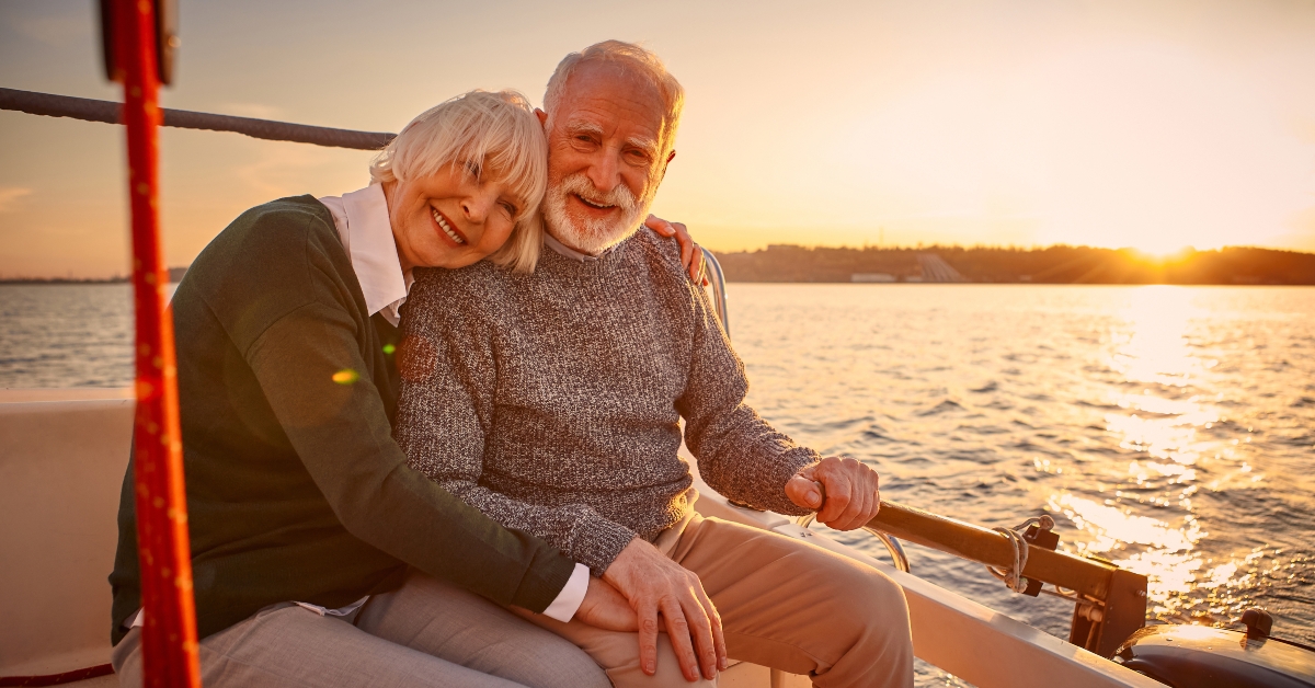 senior couple enjoying sunset