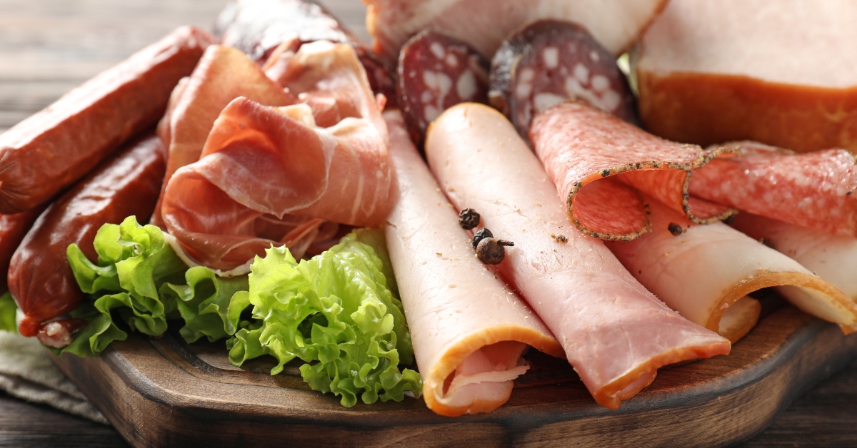 deli meats on wooden board
