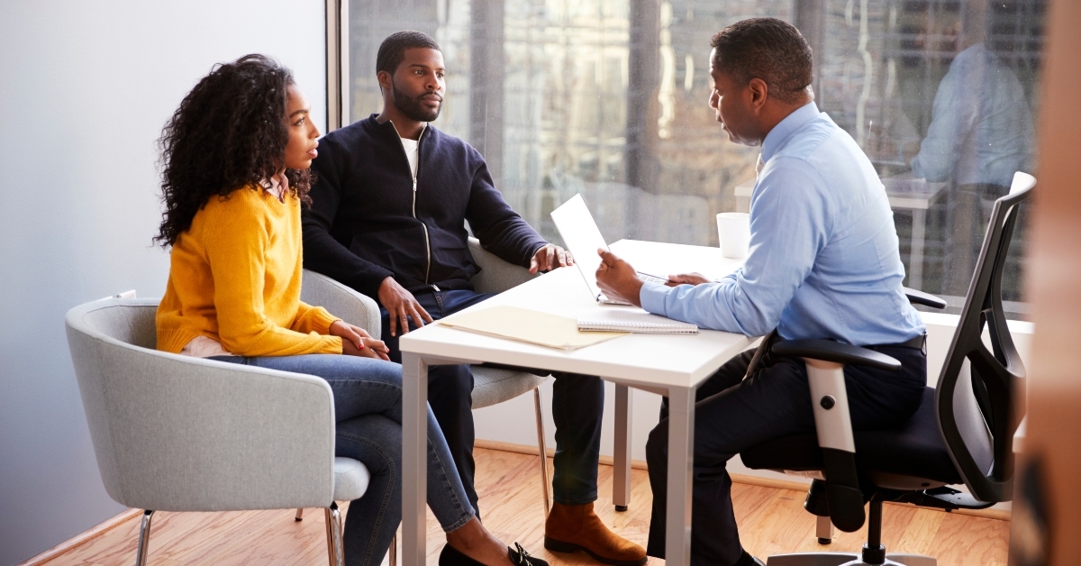 couple meeting with financial advisor