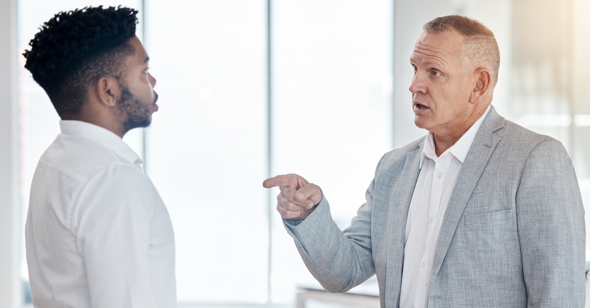 angry businessman finger pointing