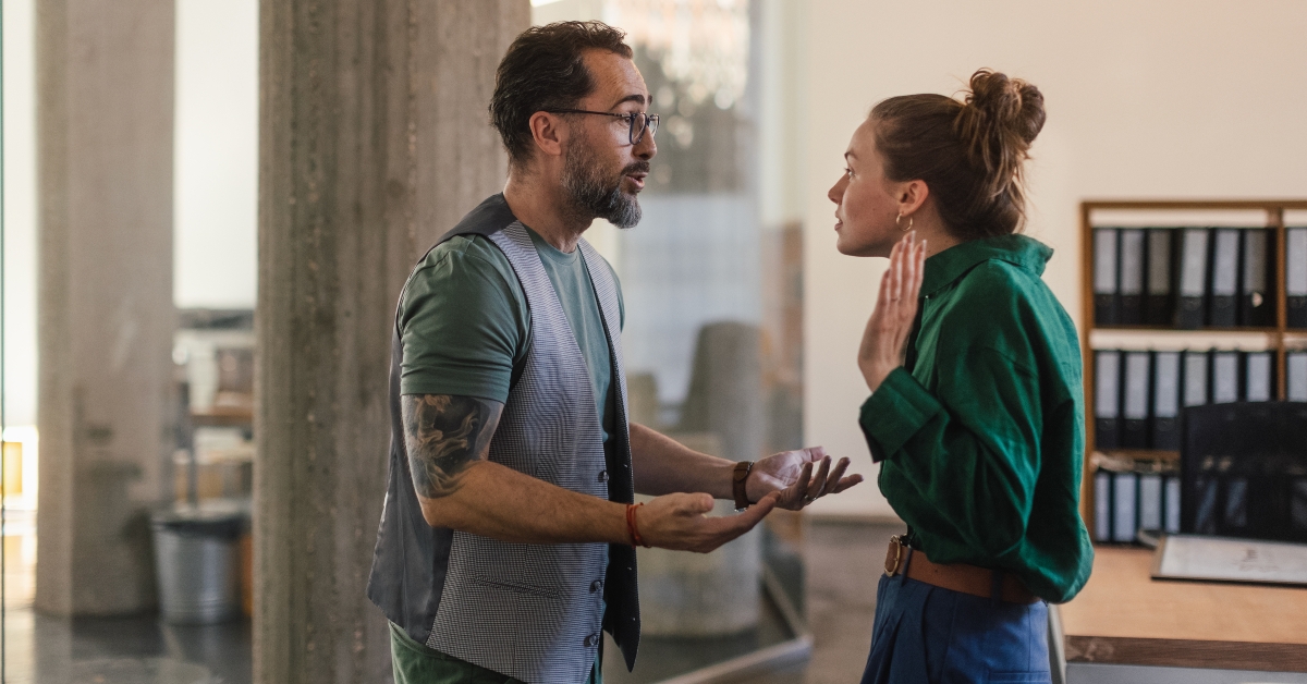 colleagues arguing in office