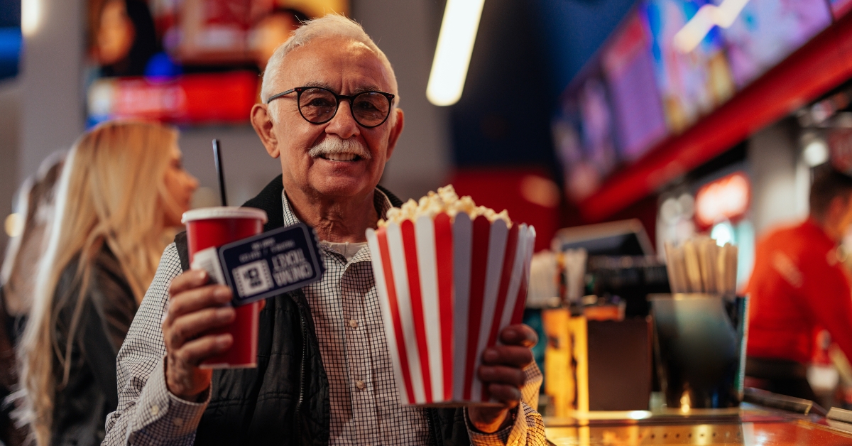joyful senior going to movies