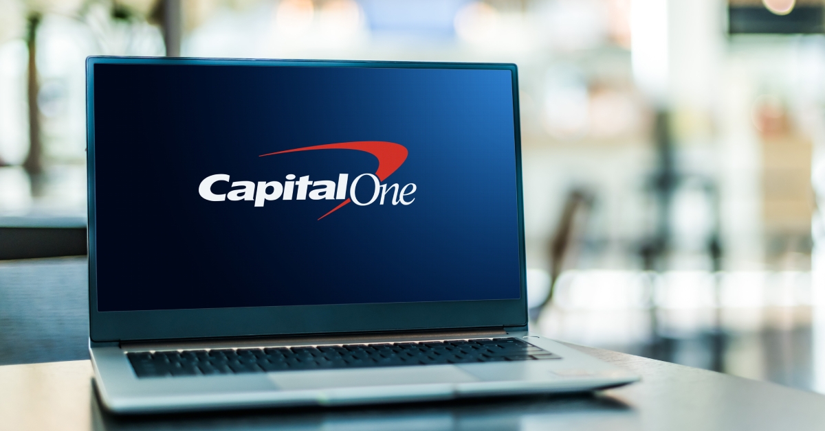 laptop displaying logo of capital one