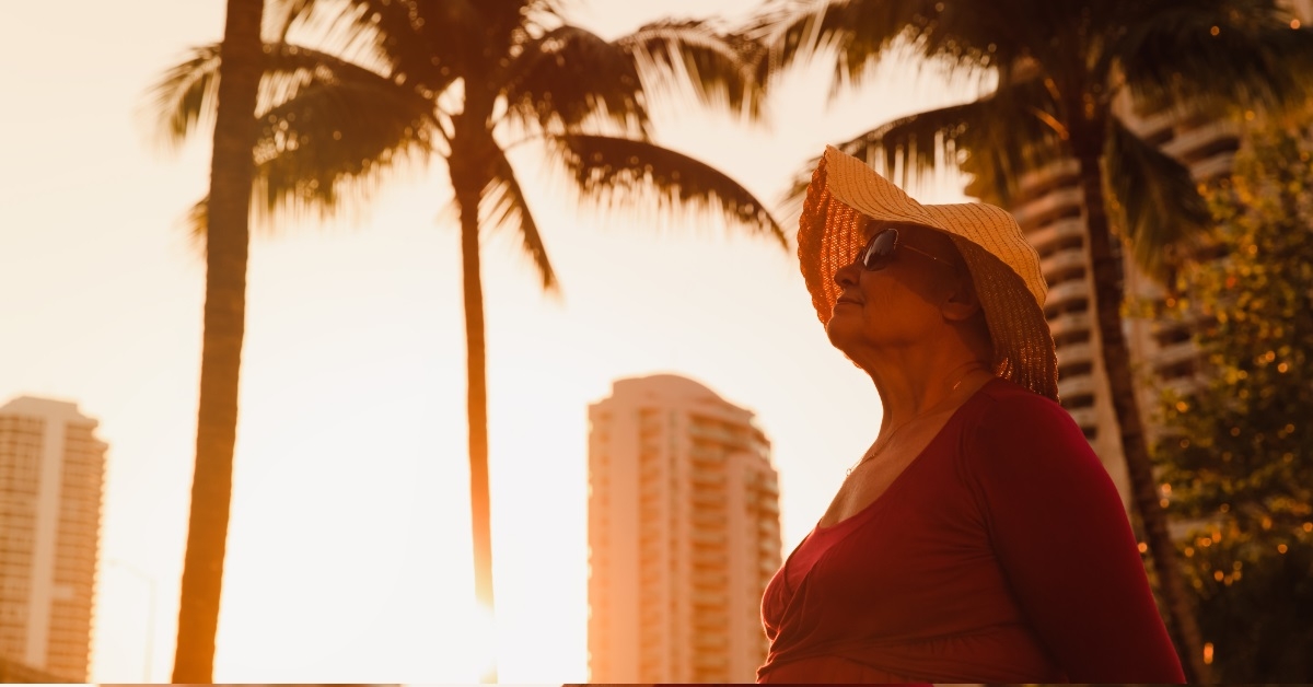 senior woman enjoying at tropical beach