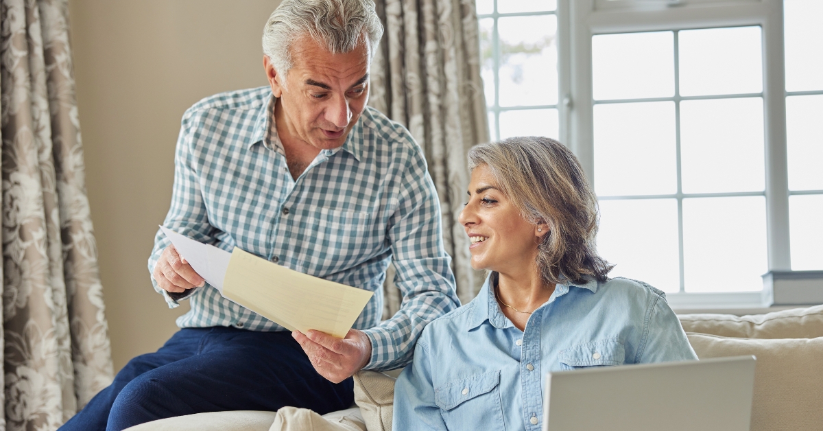 reviewing domestic finances on laptop