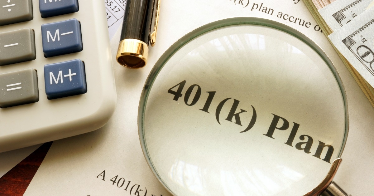 401k plan document on table