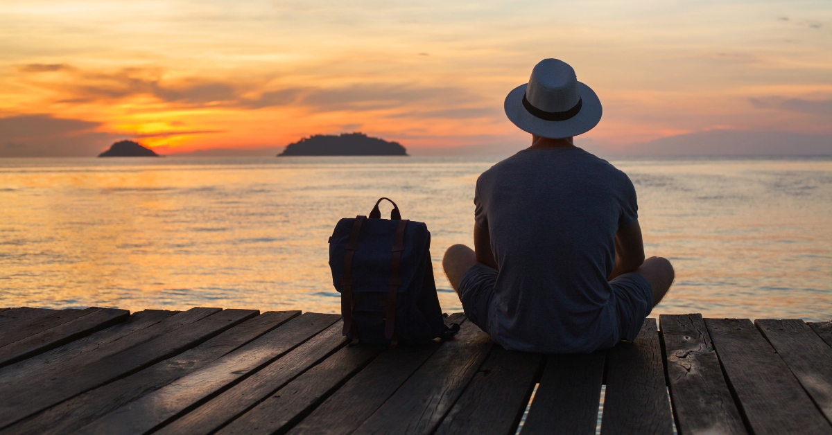 man enjoying sunset
