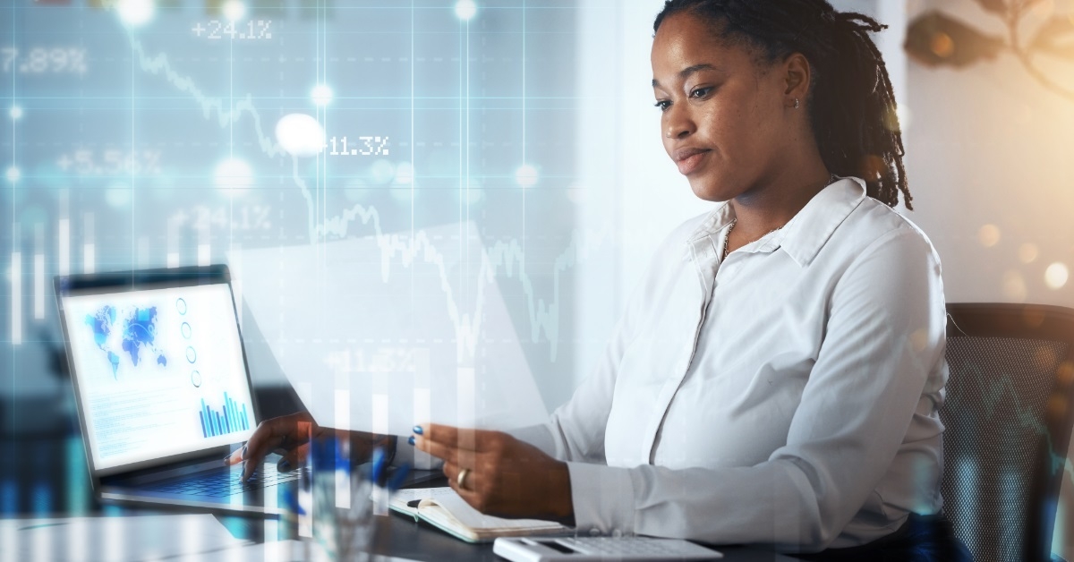 female african american broker reviewing stocks