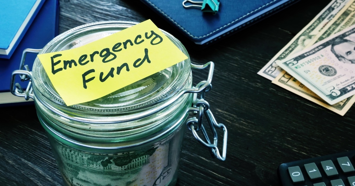 emergency fund glass jar with money