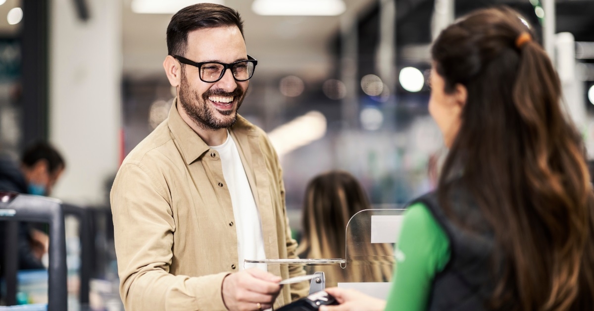 male customer using card for payment