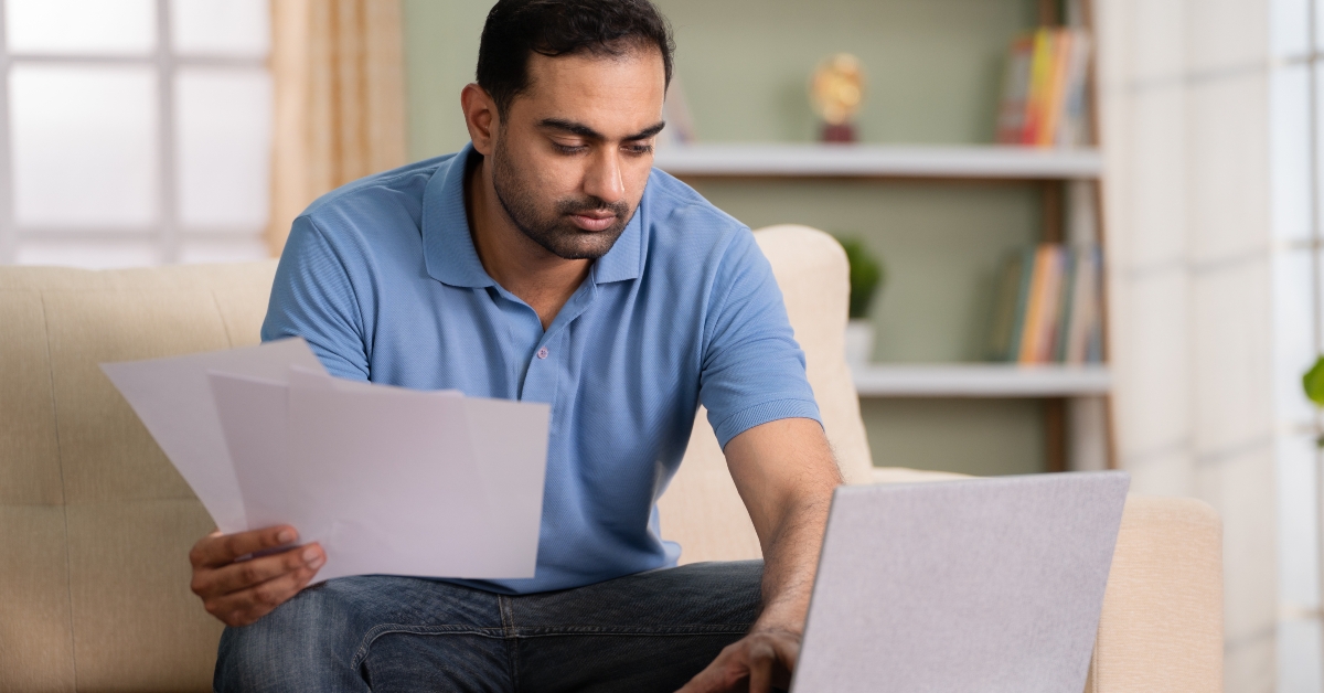 man checking documents