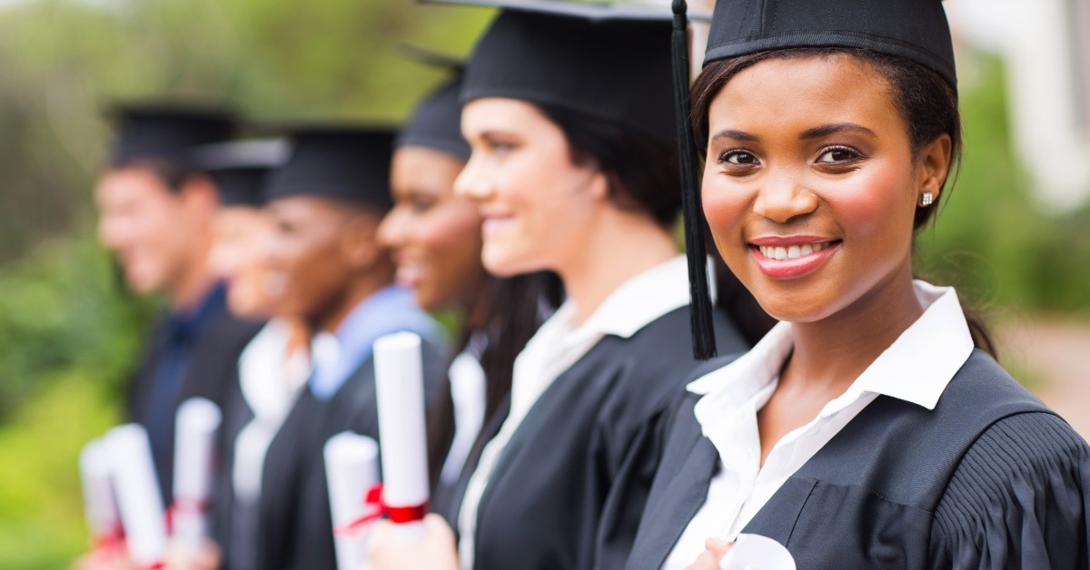 multi ethnic students at college graduation