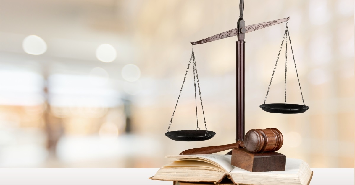 scale on law books at table