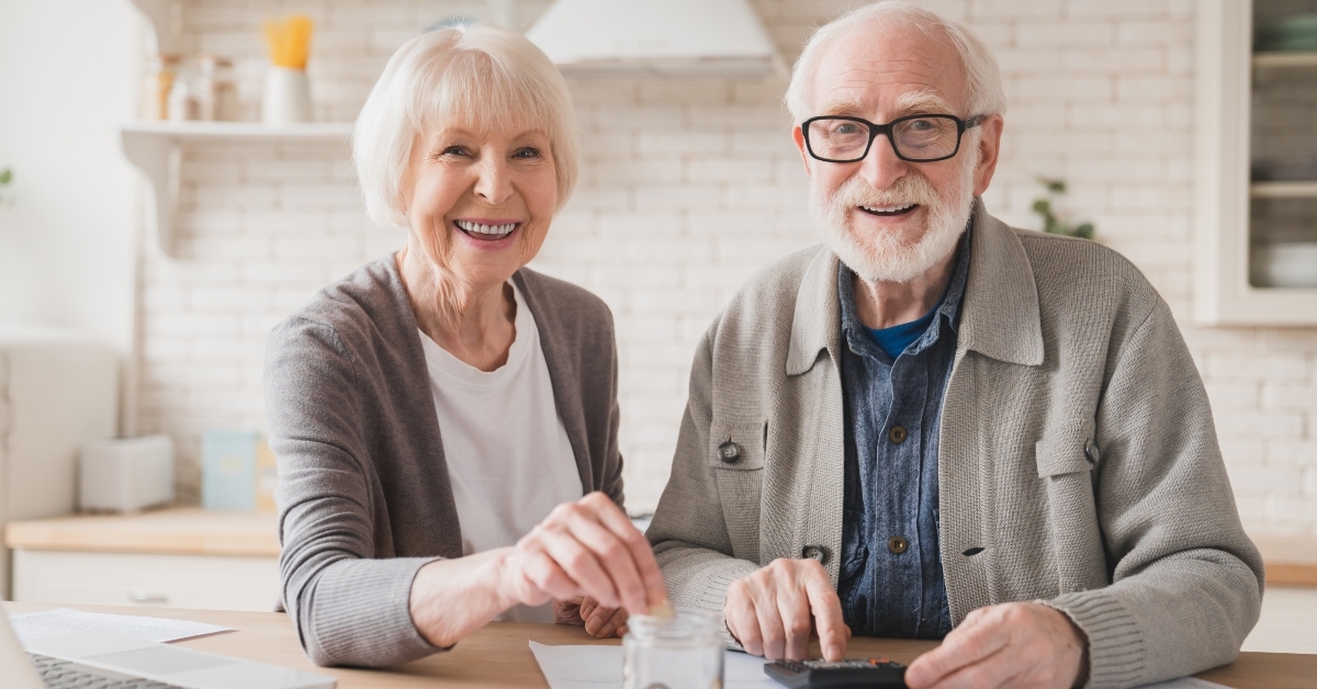 elderly couple saving money