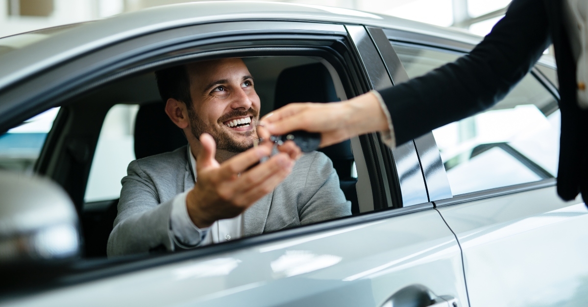 happy customer buying new car