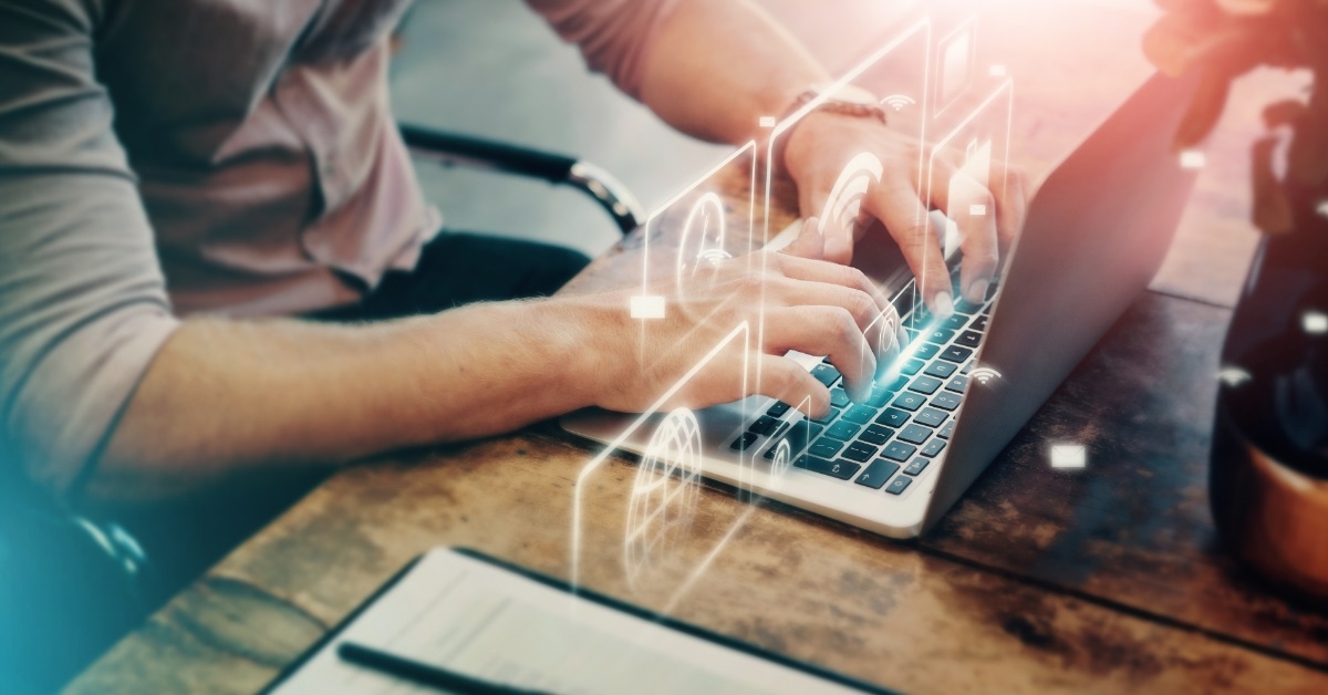 male software engineer using laptop