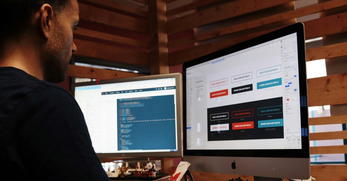 man coding at studio on computer