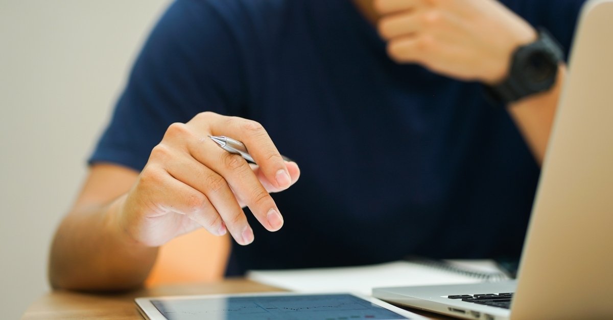 working on laptop and tablet